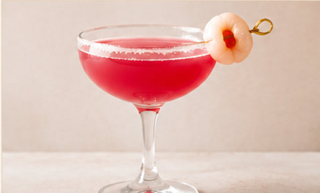 Lychee Rosetini in a sugar-rimmed coupe